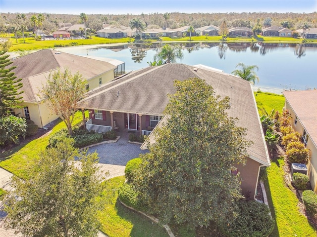 drone / aerial view with a water view