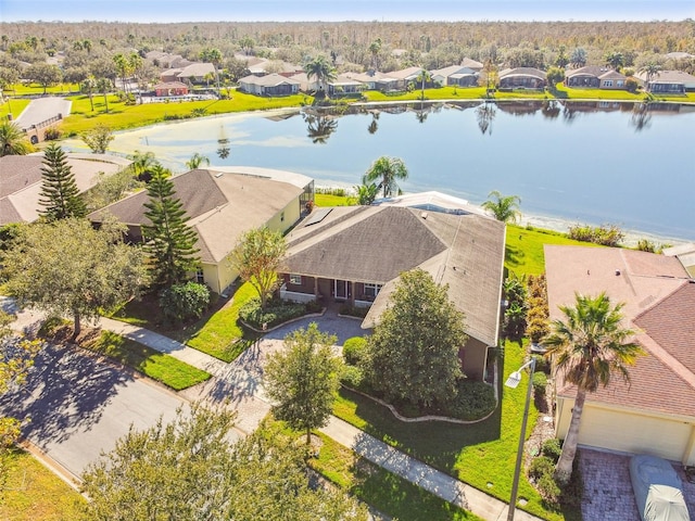 drone / aerial view with a water view