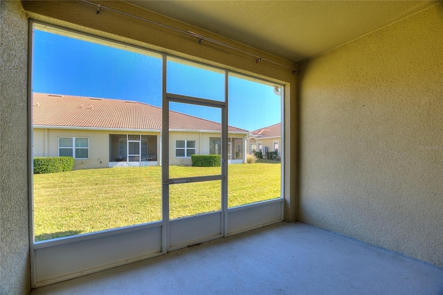 view of unfurnished sunroom