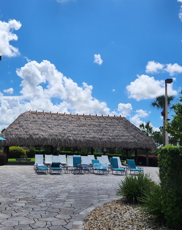 view of pool with a gazebo and a patio area