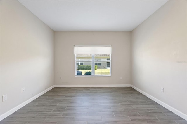 empty room featuring hardwood / wood-style flooring