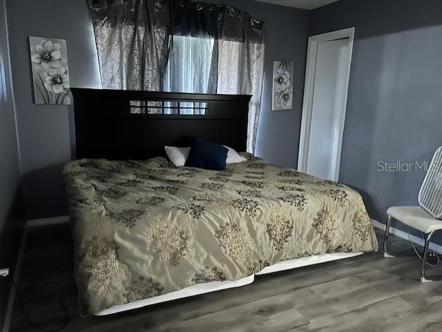 bedroom featuring hardwood / wood-style floors