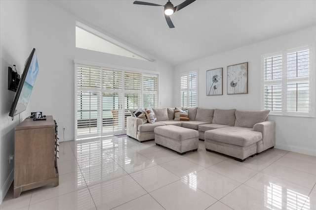 living room featuring light tile patterned floors, ceiling fan, and lofted ceiling