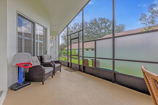 sunroom with vaulted ceiling