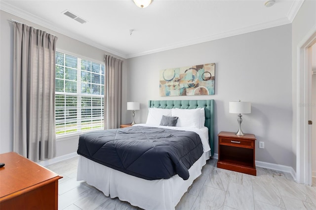 bedroom with ornamental molding