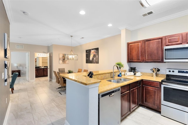 kitchen featuring kitchen peninsula, appliances with stainless steel finishes, ornamental molding, and sink