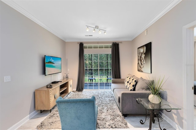 living room with crown molding and light hardwood / wood-style flooring