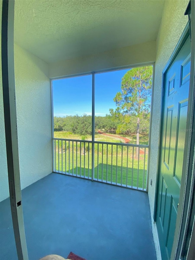 unfurnished sunroom with a healthy amount of sunlight