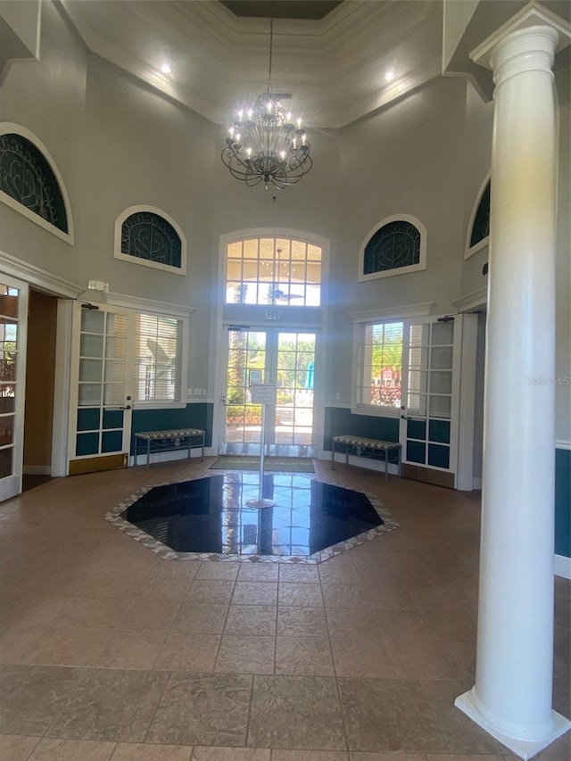 view of pool featuring french doors and a notable chandelier