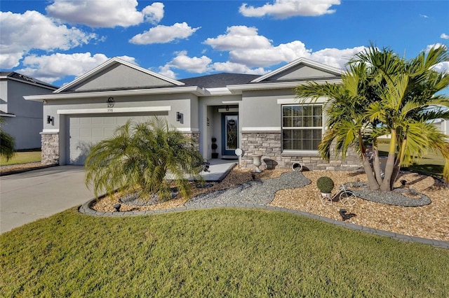 view of front of house featuring a front lawn and a garage