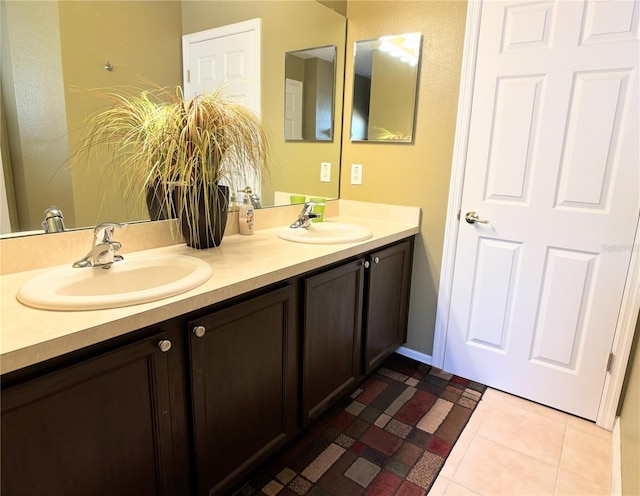 bathroom with vanity and tile patterned flooring