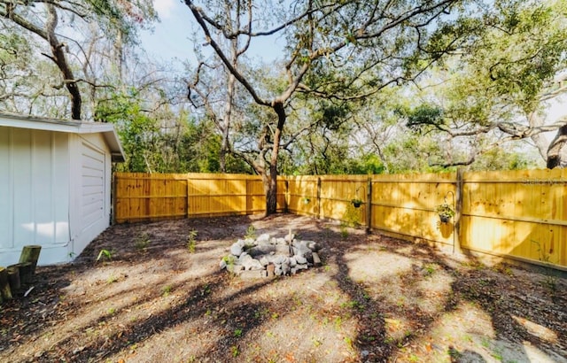 view of yard featuring a fenced backyard