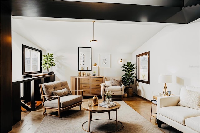 living area featuring vaulted ceiling