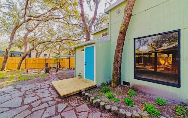 exterior space featuring a patio area and fence