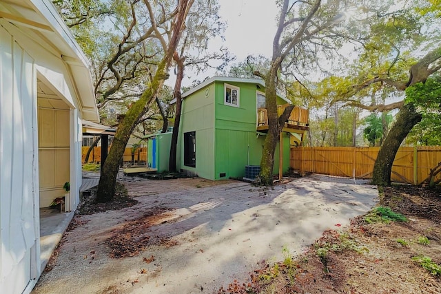 view of outdoor structure with fence