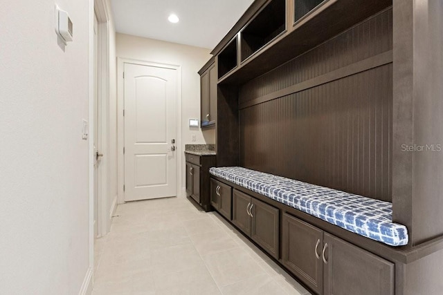 mudroom featuring recessed lighting and baseboards