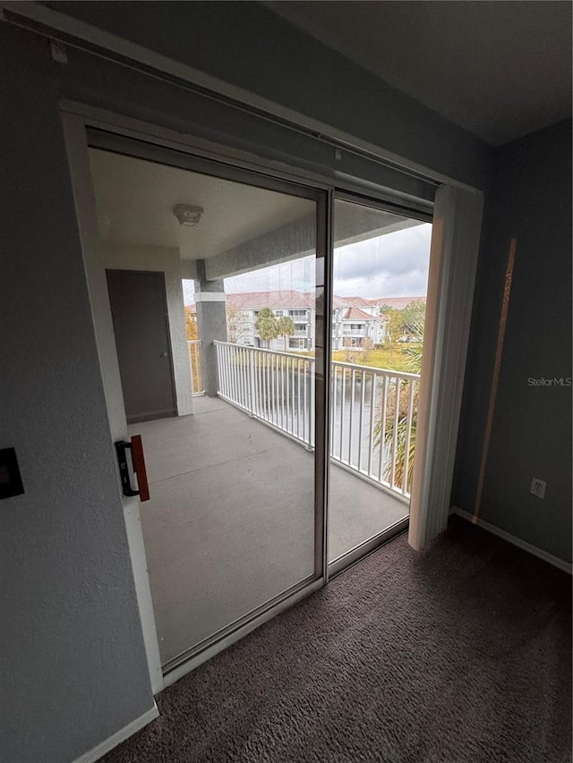 view of patio featuring a balcony