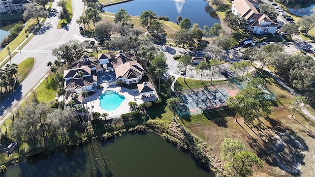 birds eye view of property featuring a water view