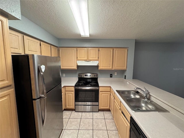 kitchen with light brown cabinetry, sink, light tile patterned floors, and appliances with stainless steel finishes