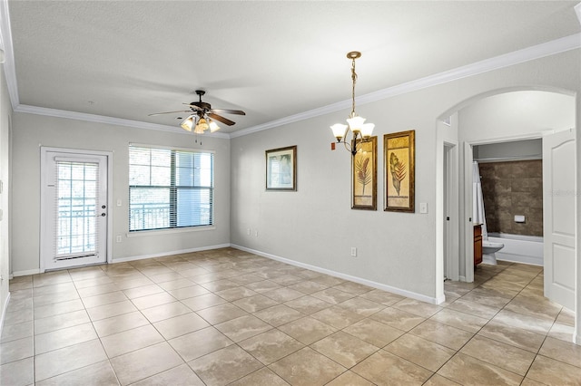 empty room featuring a textured ceiling, crown molding, light tile patterned floors, and ceiling fan with notable chandelier