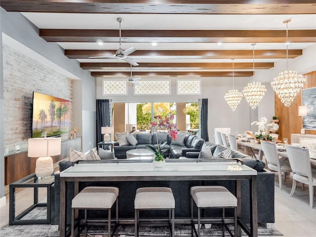 dining room featuring beamed ceiling and ceiling fan with notable chandelier