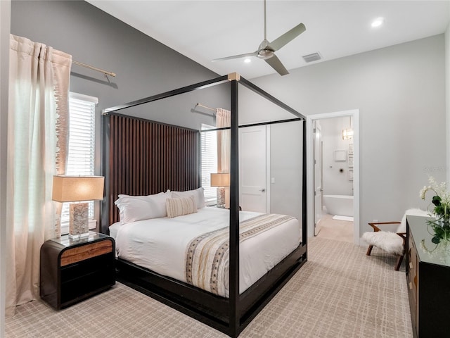 bedroom featuring ceiling fan and ensuite bathroom