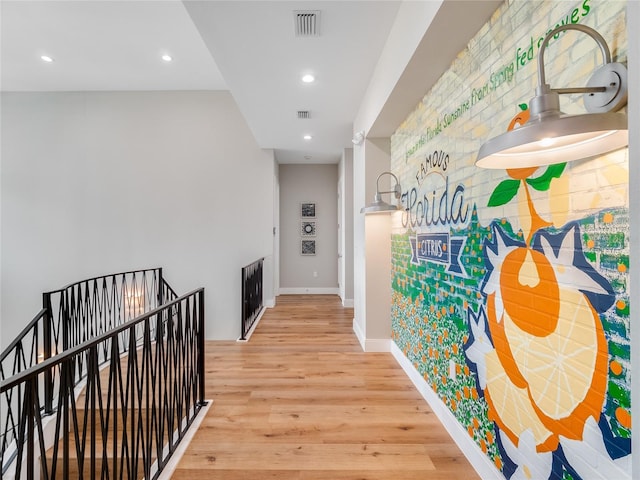 hallway featuring light hardwood / wood-style flooring