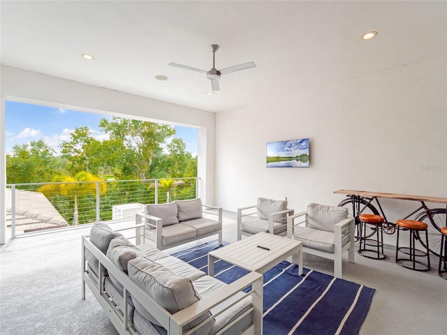 living room with ceiling fan