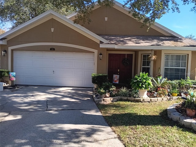 single story home featuring a garage