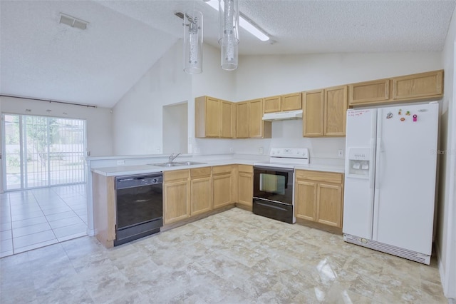 kitchen featuring kitchen peninsula, light brown cabinetry, a textured ceiling, white appliances, and sink