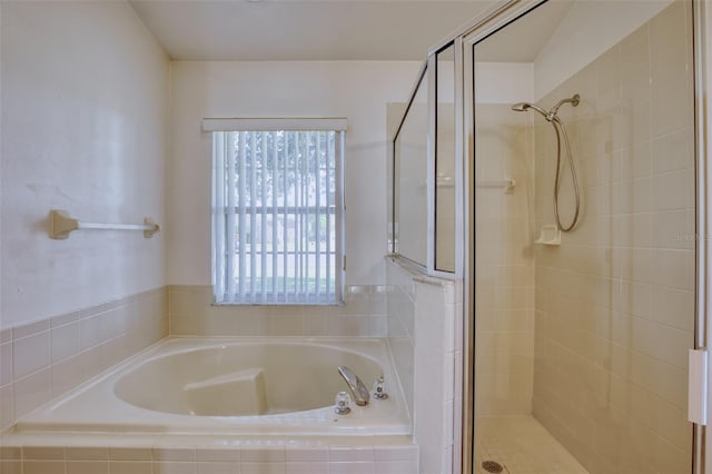 bathroom with separate shower and tub