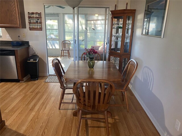 dining space featuring light hardwood / wood-style flooring