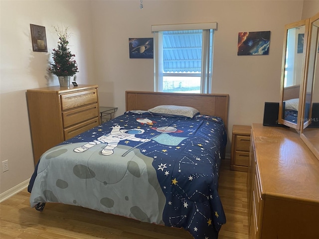 bedroom featuring light hardwood / wood-style floors