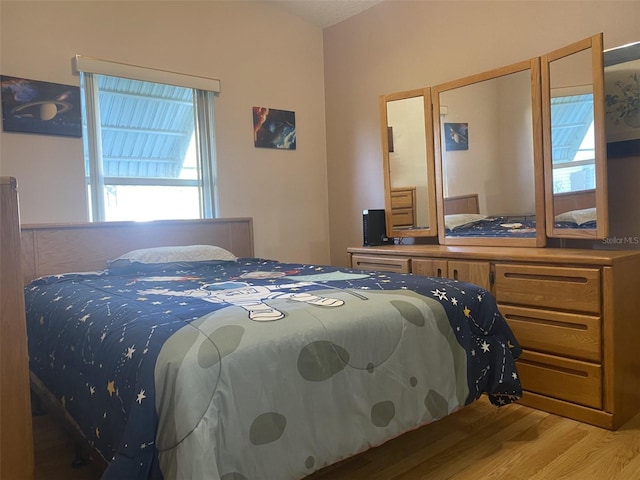 bedroom with light hardwood / wood-style floors