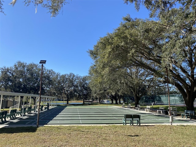 view of community featuring a yard