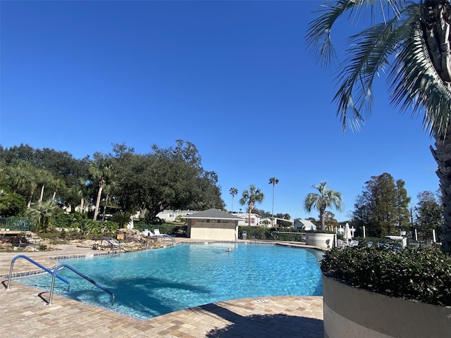 pool featuring a patio area