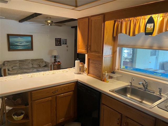 kitchen with kitchen peninsula, ceiling fan, sink, and black dishwasher