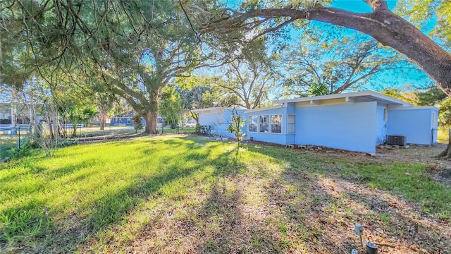 view of yard featuring central AC