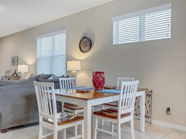 dining room featuring light tile patterned floors