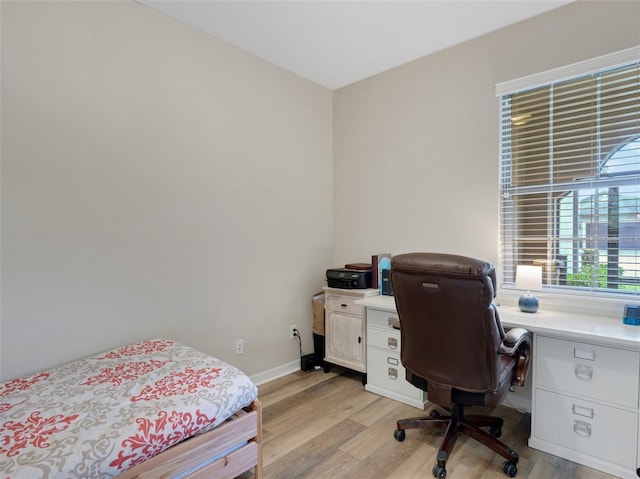 bedroom with light hardwood / wood-style flooring