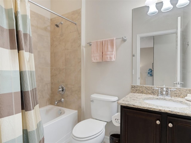 full bathroom featuring vanity, shower / bath combination with curtain, and toilet