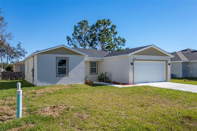 ranch-style home featuring a garage, driveway, a front lawn, and stucco siding