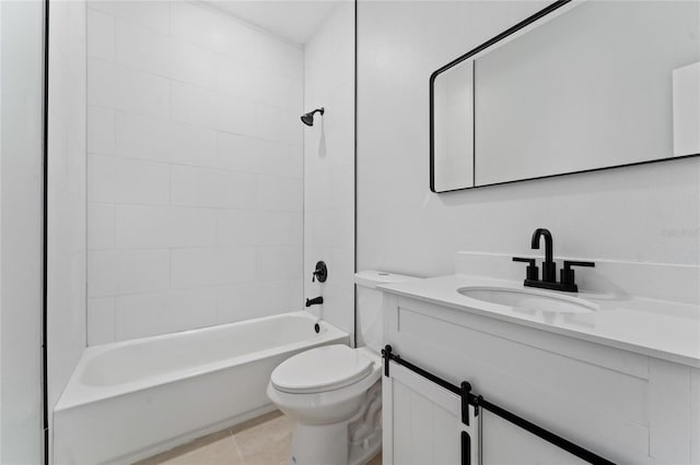 full bathroom with tile patterned flooring, vanity, tiled shower / bath combo, and toilet