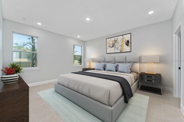 bedroom with light tile patterned floors, baseboards, and recessed lighting