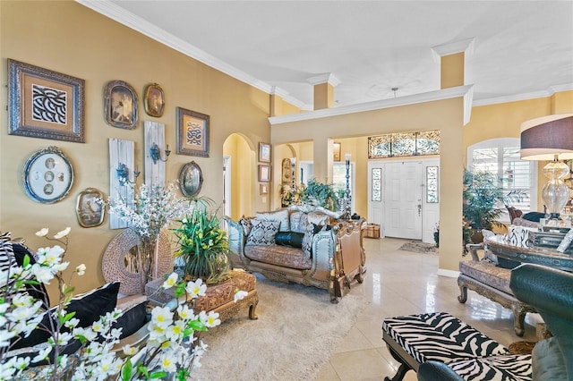 living room featuring ornamental molding and light tile patterned floors