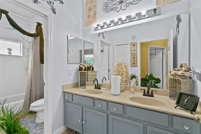 full bathroom featuring vanity, toilet, and shower / tub combo