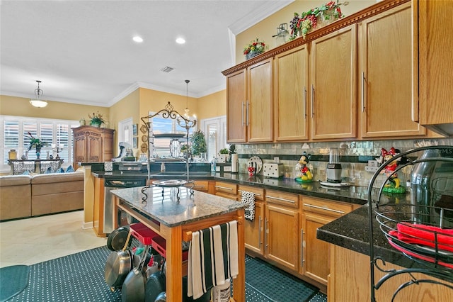 kitchen featuring tasteful backsplash, crown molding, pendant lighting, dishwasher, and a center island