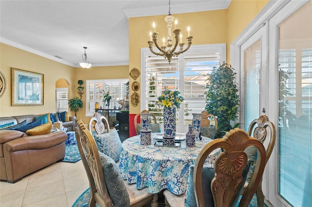 tiled dining room with crown molding and an inviting chandelier