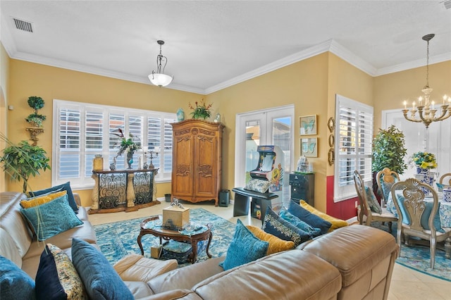 tiled living room with plenty of natural light, ornamental molding, and a chandelier