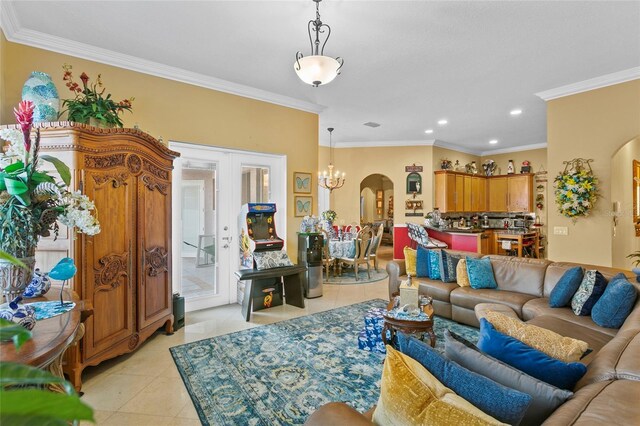 tiled living room with an inviting chandelier and crown molding